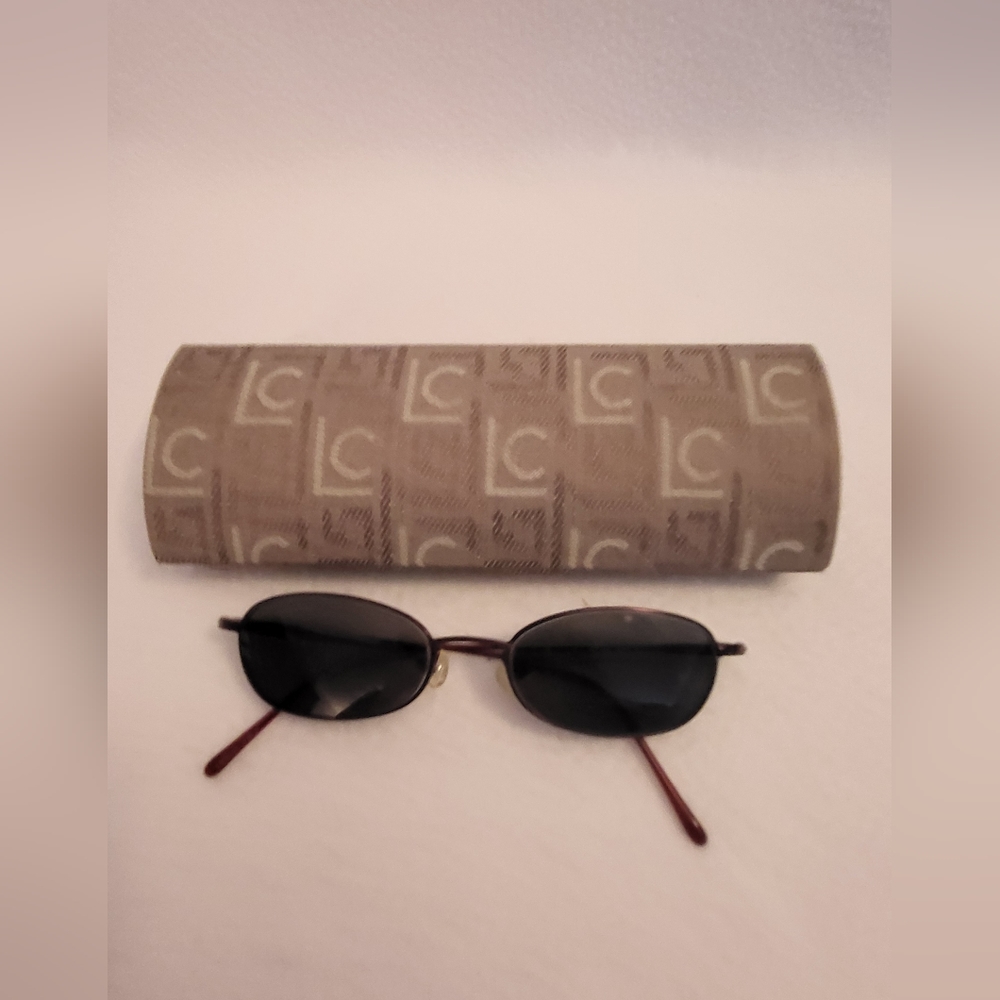 Covergirl wire frame eye glasses, vintage wine color